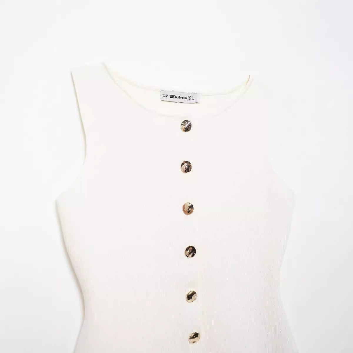 Golden button embellished flat needle vest.