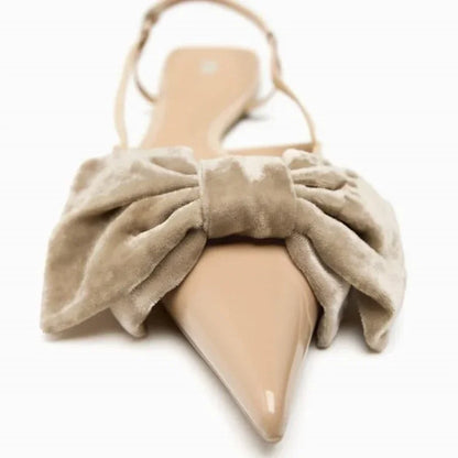Light beige bow embellished exposed heel flat shoes