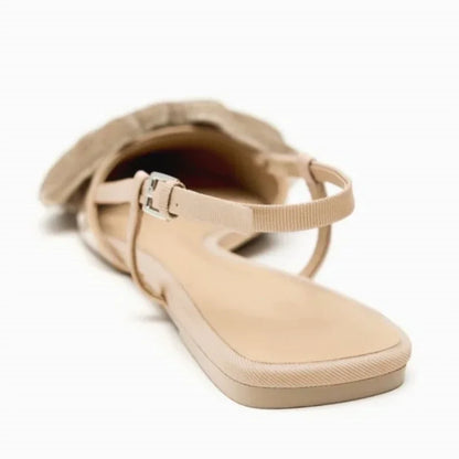 Light beige bow embellished exposed heel flat shoes