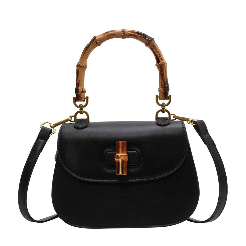 Handheld bamboo bag women's shoulder bag retro saddle bag.