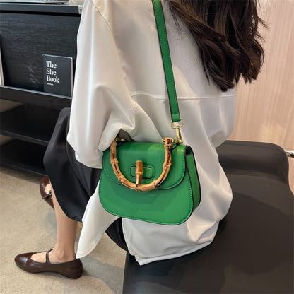 Handheld bamboo bag women's shoulder bag retro saddle bag.