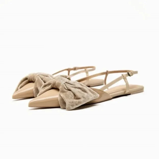 Light beige bow embellished exposed heel flat shoes