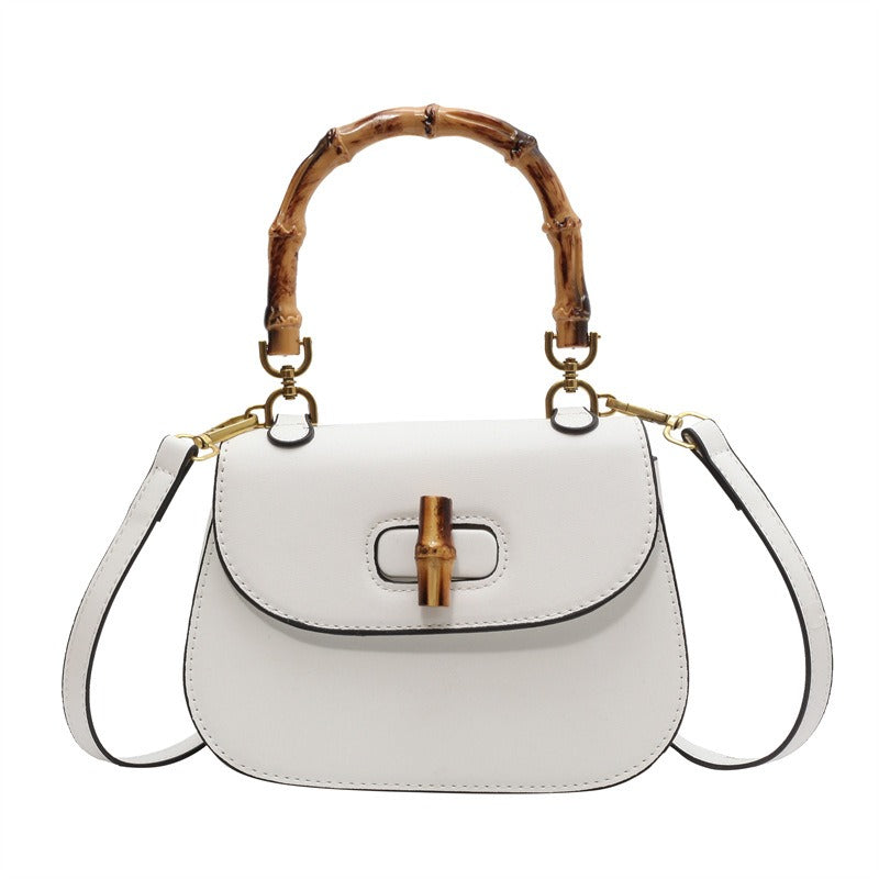 Handheld bamboo bag women's shoulder bag retro saddle bag.