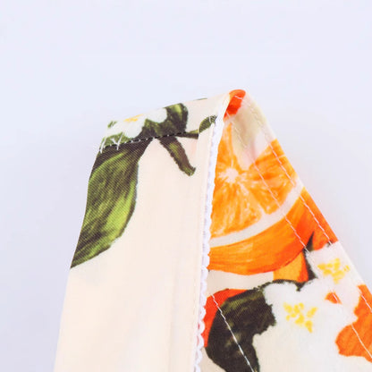 Low neck fruit patterned camisole dress for women.