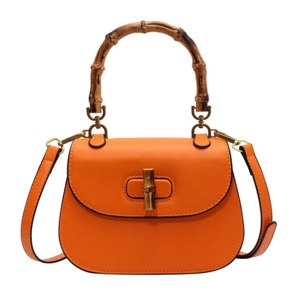 Handheld bamboo bag women's shoulder bag retro saddle bag.