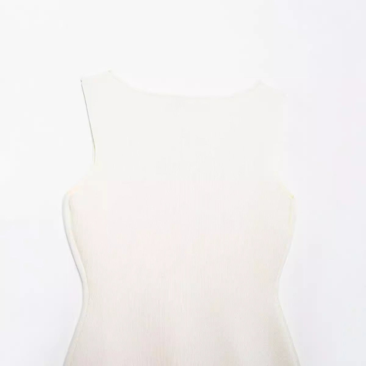 Golden button embellished flat needle vest.