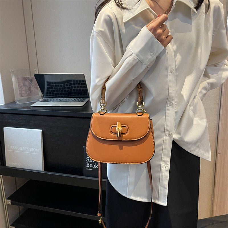 Handheld bamboo bag women's shoulder bag retro saddle bag.